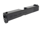 Glock 20 Gen 4 OEM slide seated in black foam inside brown cardboard shipping box on wooden workbench